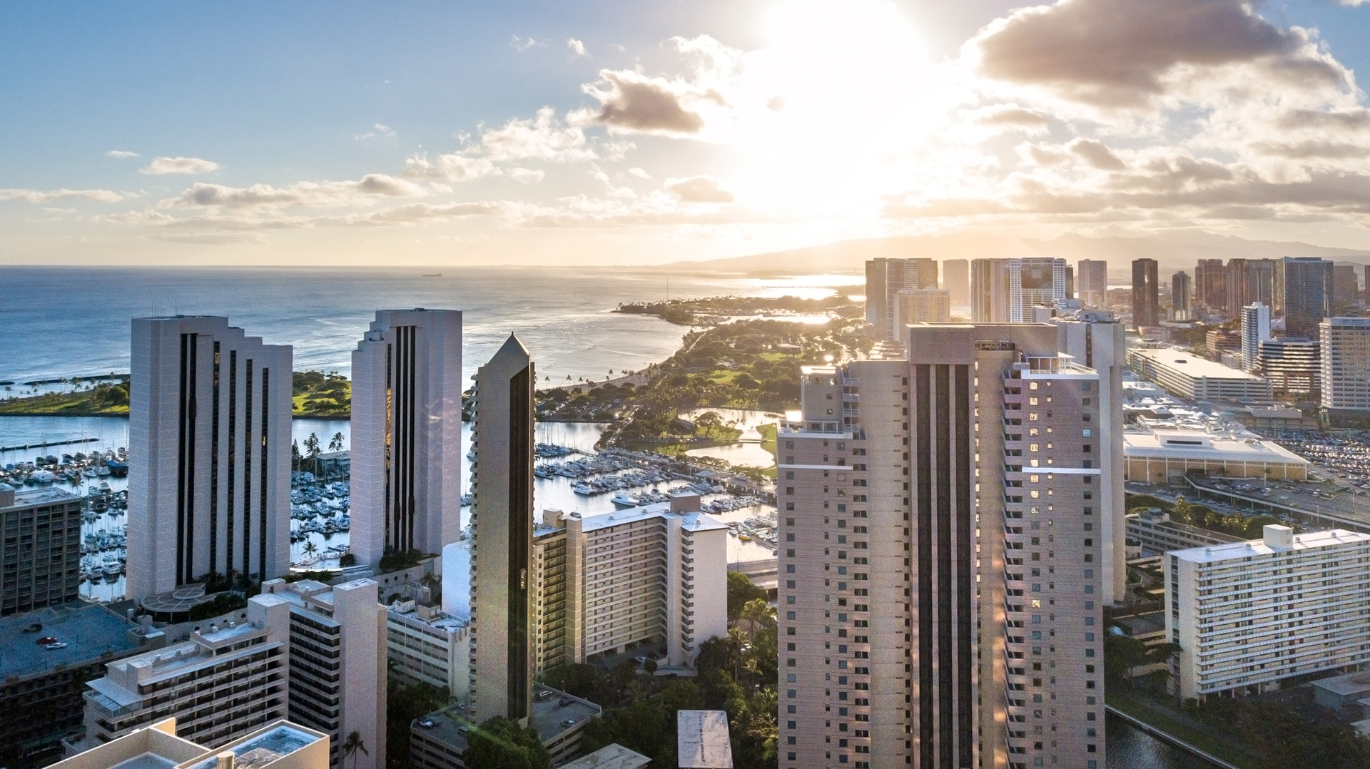 Aerial view of the Honolulu coastline at sunset
