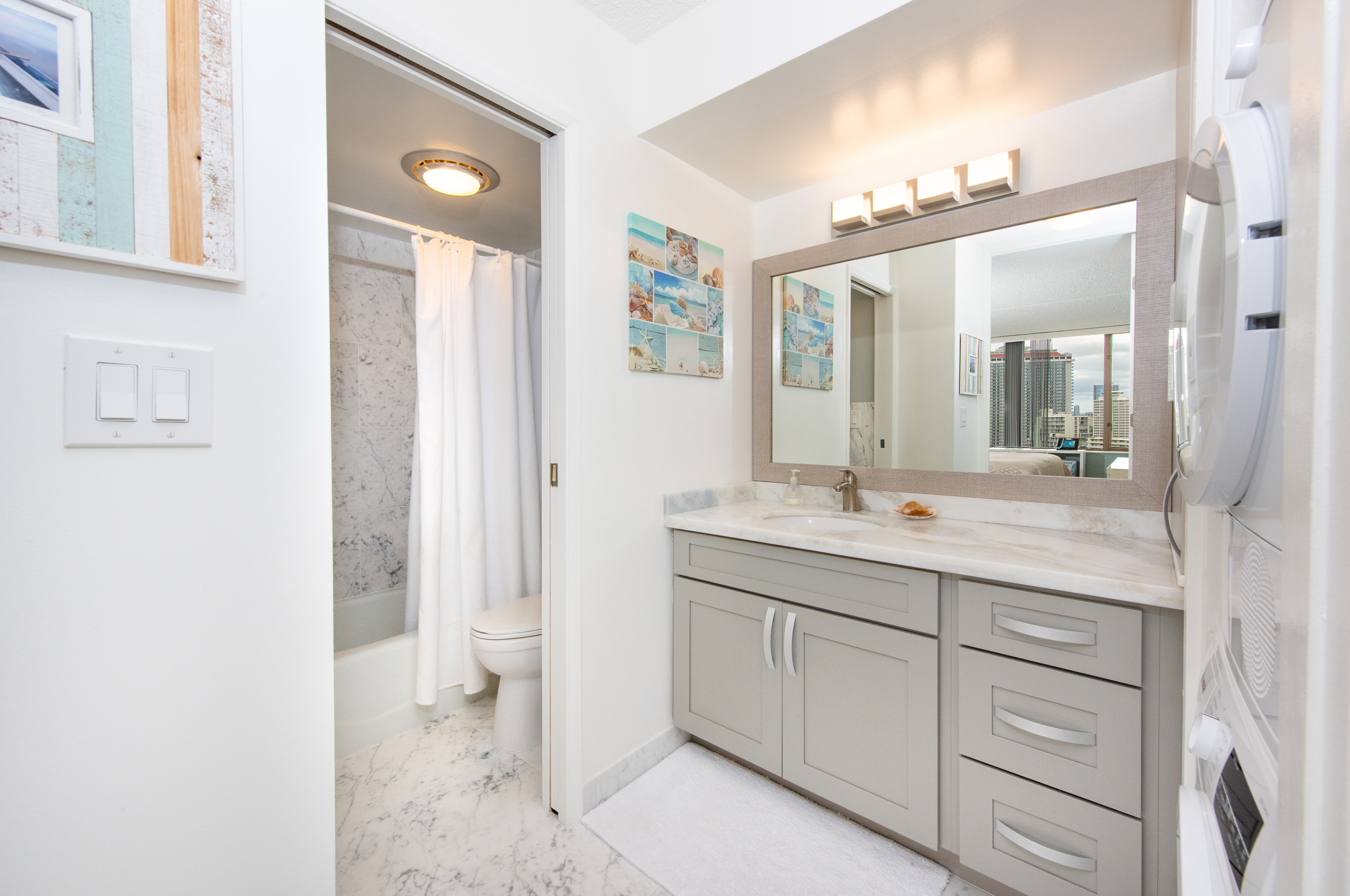 Clean and modern bathroom with marble-style flooring