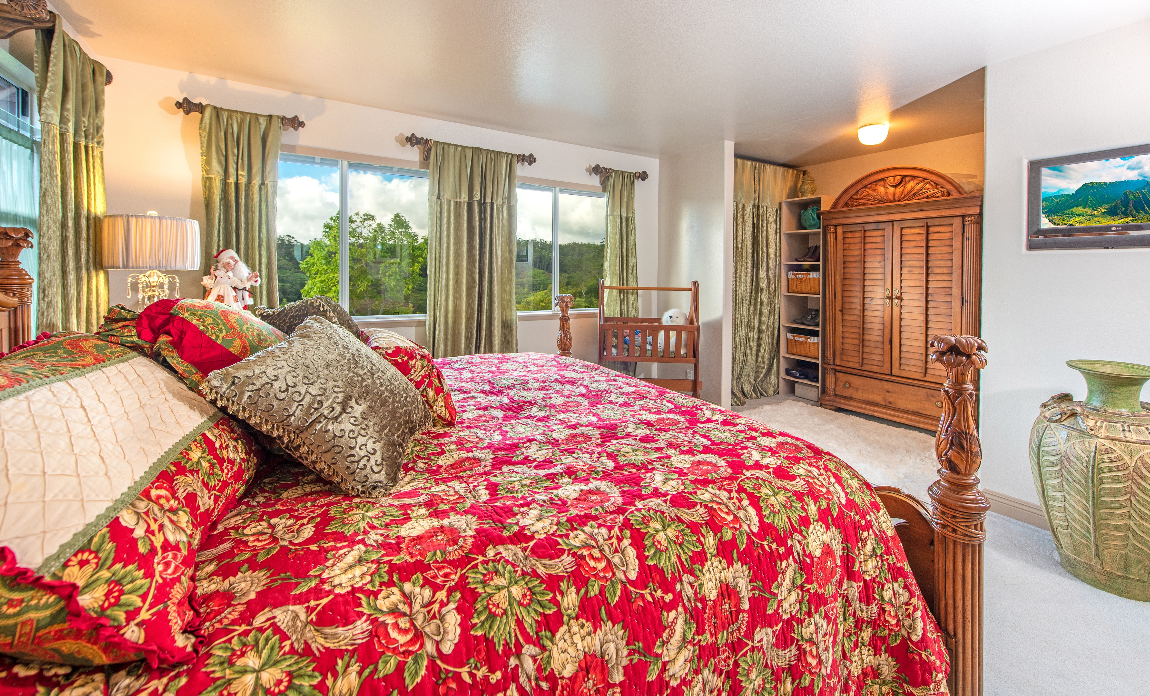 Traditionally decorated bedroom with a large wooden bed
