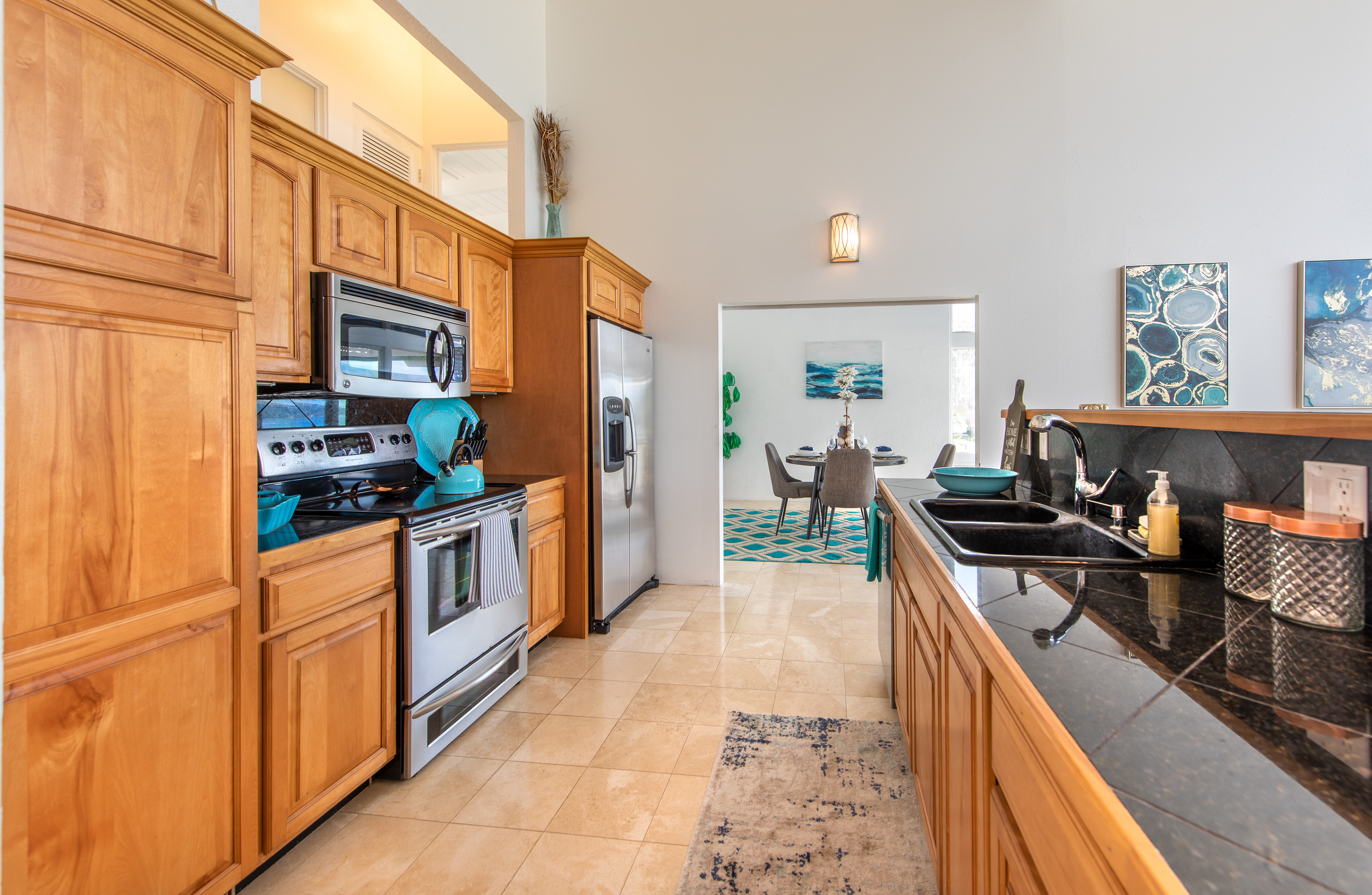 Kitchen with classic wood cabinets and stainless steel appliances